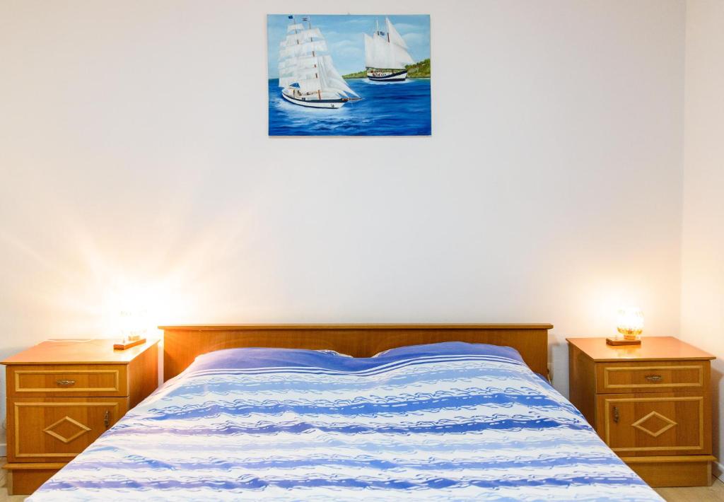 Postel nebo postele na pokoji v ubytování Apartman Lu