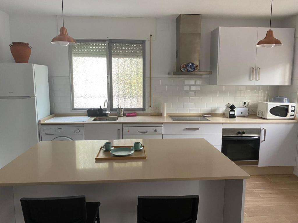 Kuchyň nebo kuchyňský kout v ubytování Villa Marta