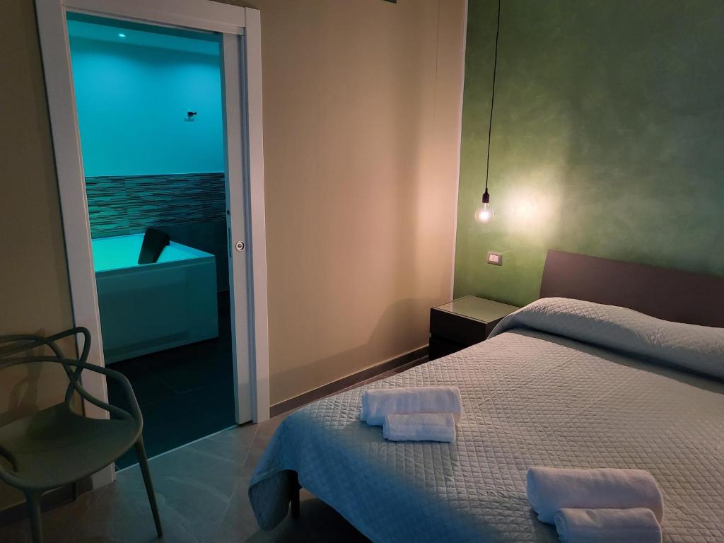 Postel nebo postele na pokoji v ubytování Casa dello stretto