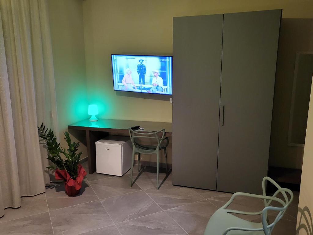 TV a/nebo společenská místnost v ubytování Casa dello stretto
