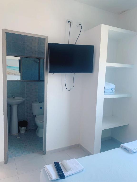 TV a/nebo společenská místnost v ubytování Blue Apartahotel