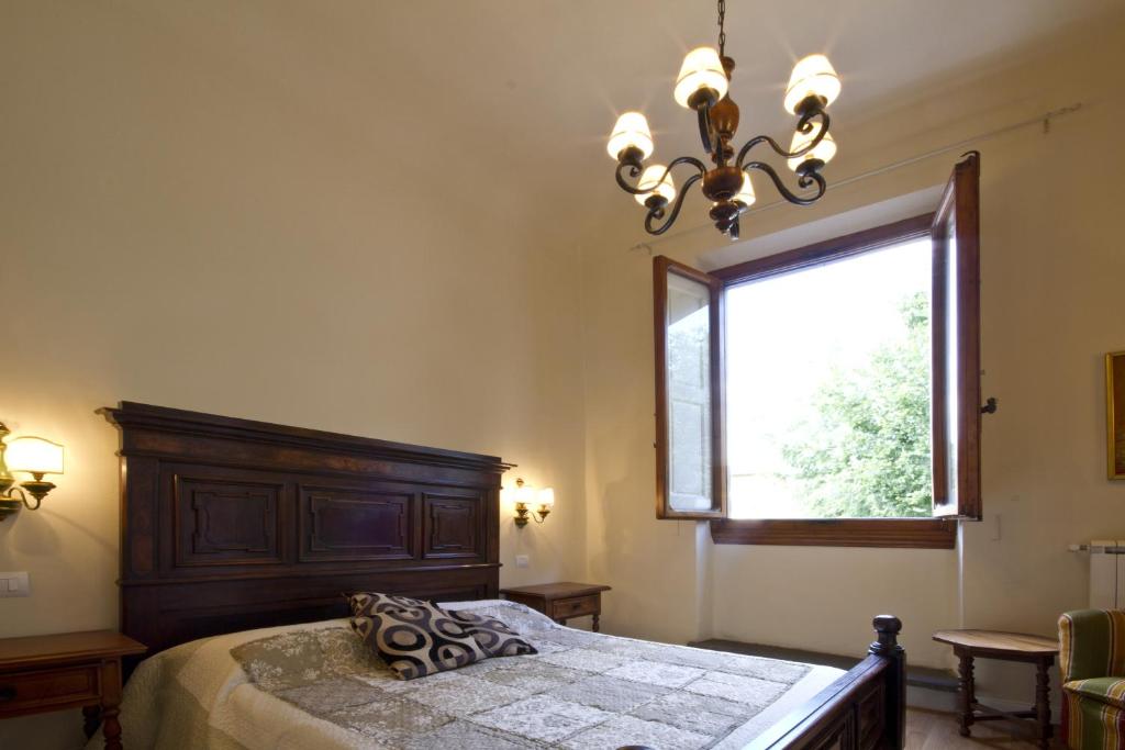 Voodi või voodid majutusasutuse San Marco Apartment toas