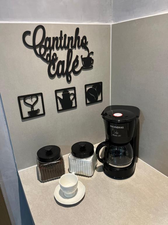 Comodidades para preparar café e chá em Flat 313 Bauten Cabo Branco