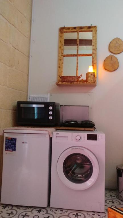 Kuchyň nebo kuchyňský kout v ubytování Triesti Home