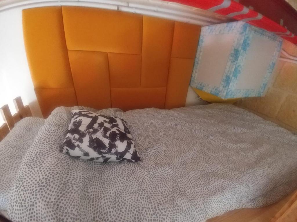 Postel nebo postele na pokoji v ubytování Triesti Home