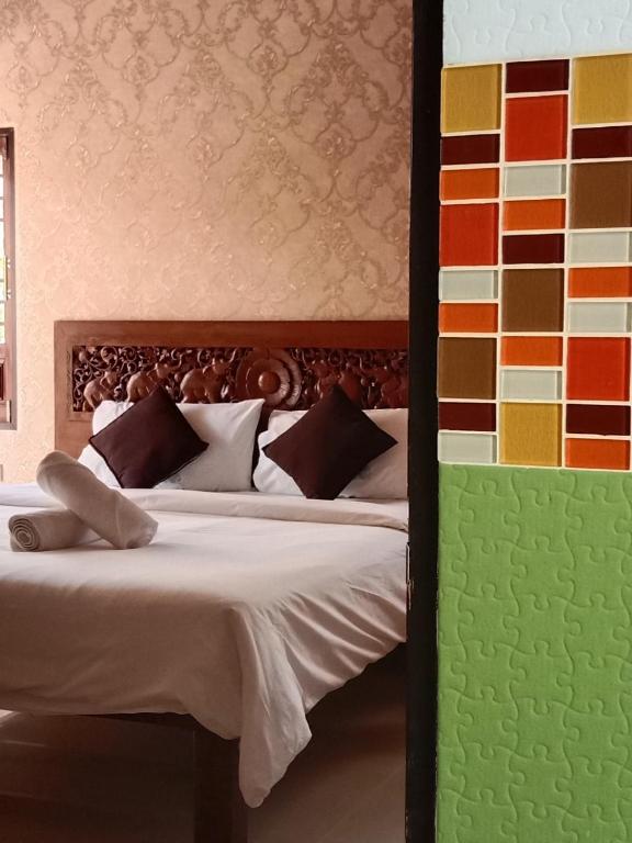 Postel nebo postele na pokoji v ubytování Fueangfu Villa Chaweng