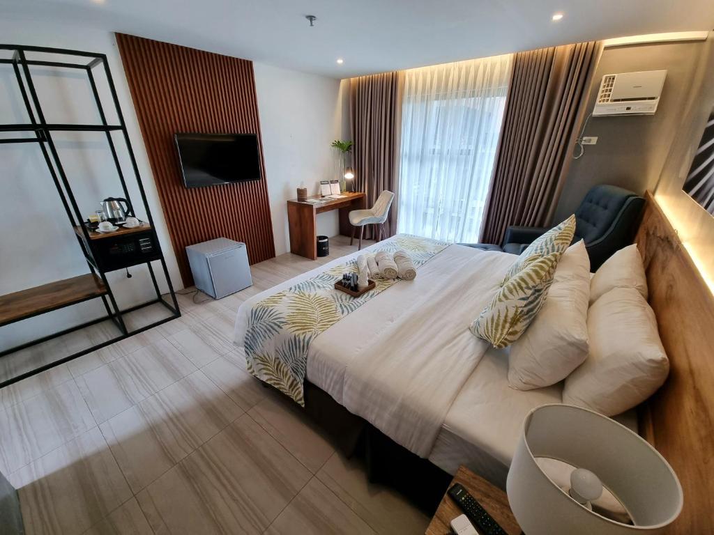 Postel nebo postele na pokoji v ubytování Balar Hotel and Spa