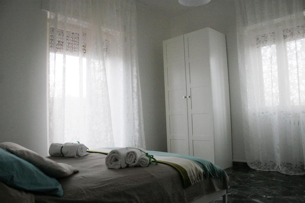 Postel nebo postele na pokoji v ubytování A Casa di Tilde