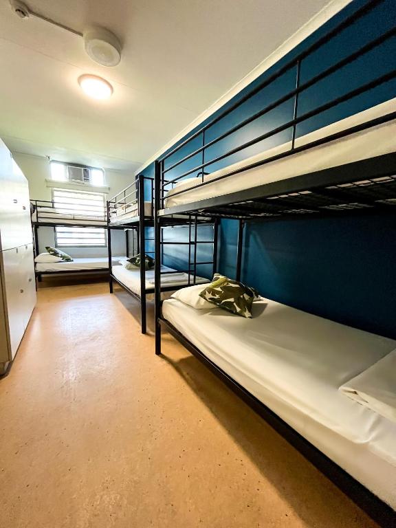Postel nebo postele na pokoji v ubytování MOM Darwin