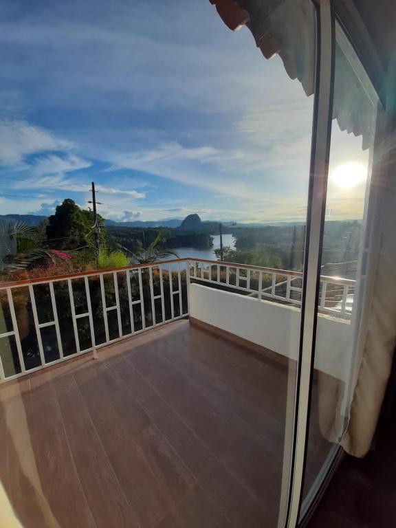 a view from the balcony of a house at Finca-hotel Montecarlo Guatape by Hope in Guatapé