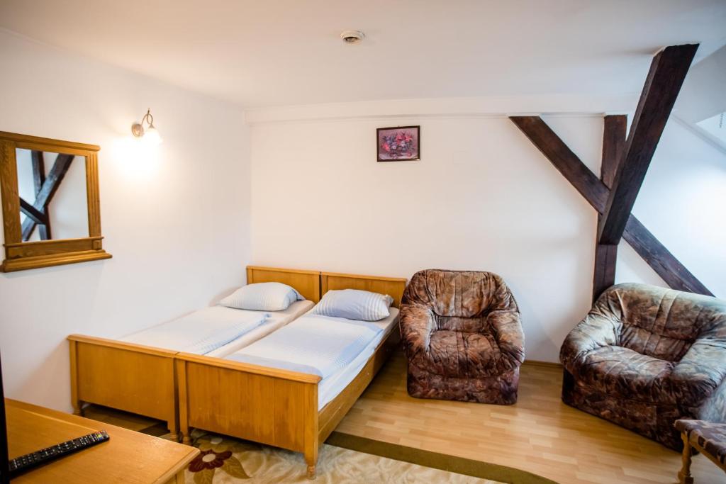 Postel nebo postele na pokoji v ubytování HOTEL MARION