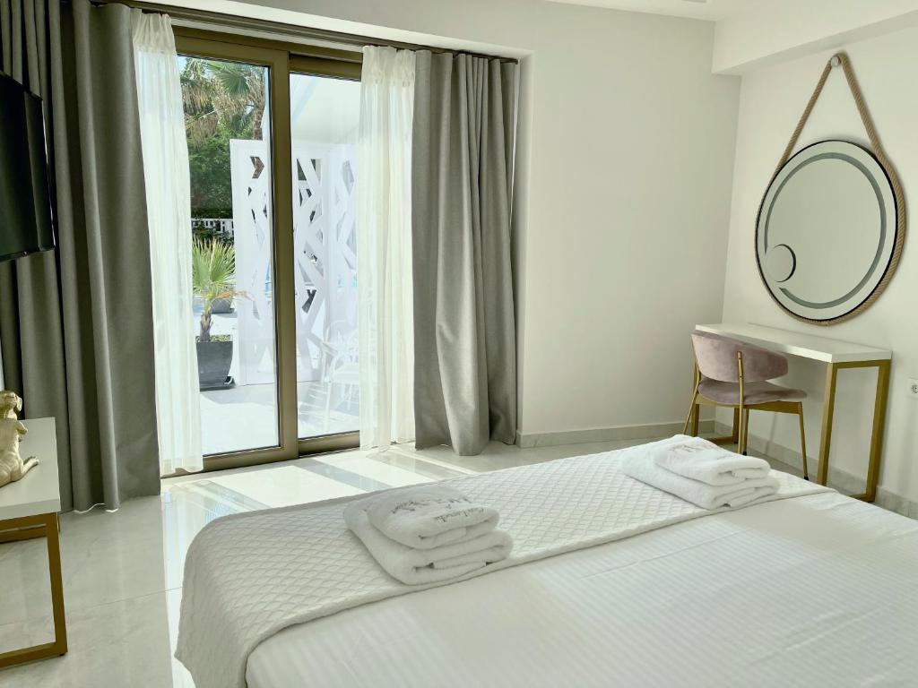 Postel nebo postele na pokoji v ubytování Laguna Resort by Diomedes Group