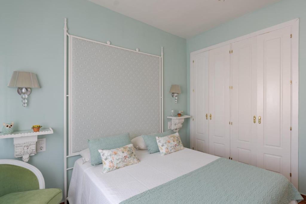 A bed or beds in a room at Costa Ballena Unifamiliar