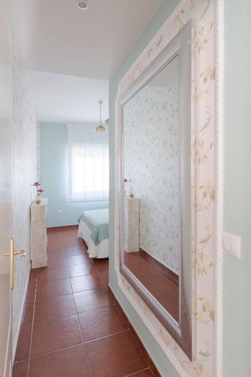 A bed or beds in a room at Costa Ballena Unifamiliar