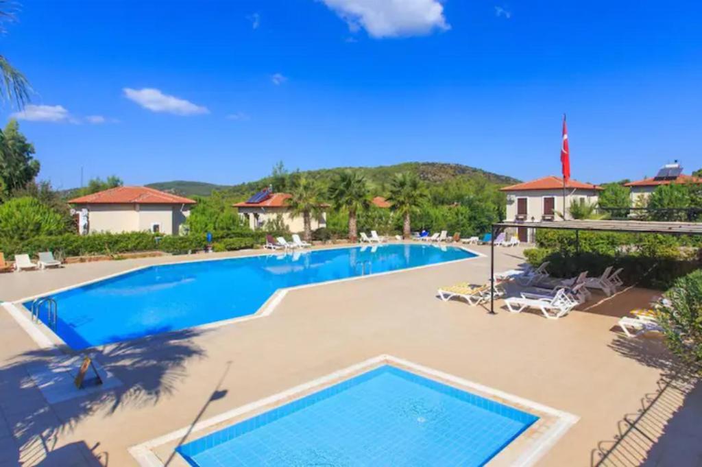 Bazén v ubytování Oludeniz Evleri C3 Suite , Havuz, Barbeku, Balkon Teras nebo v jeho okolí