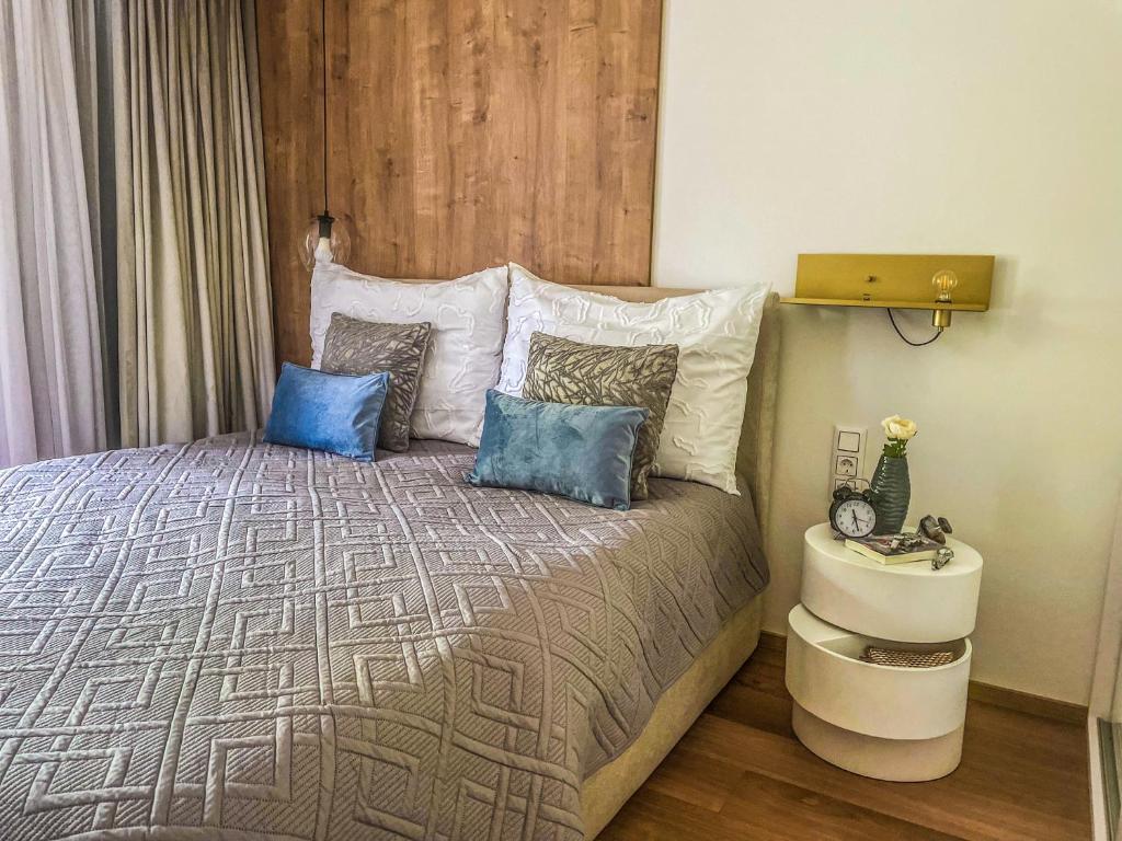 Postel nebo postele na pokoji v ubytování Napfény Resort Apartman
