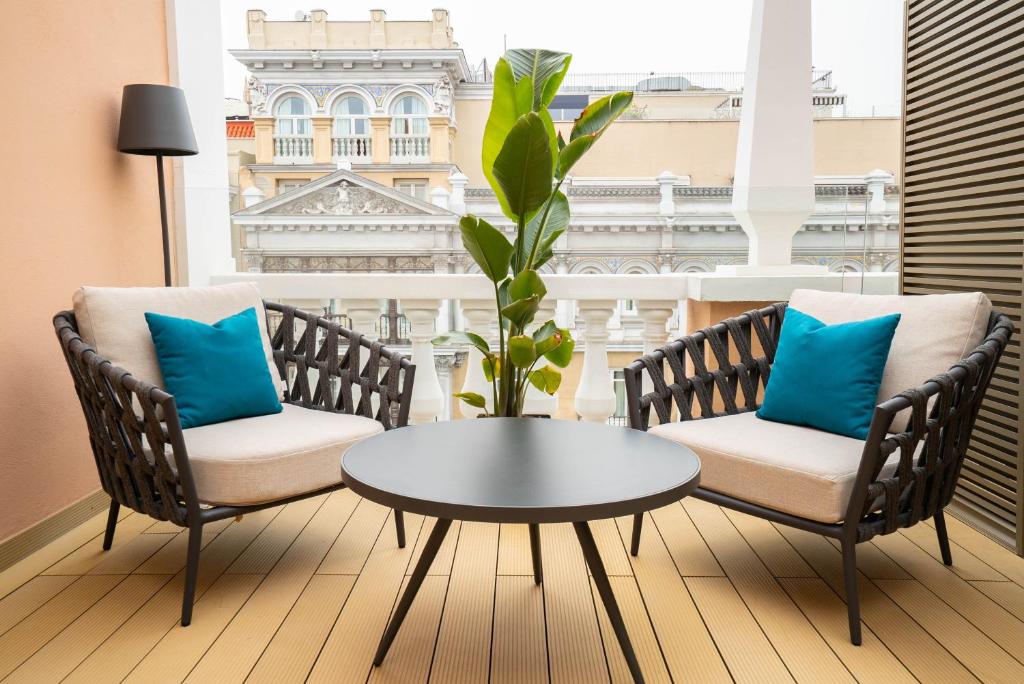 Posezení v ubytování SmartRental Collection Gran Vía Capital