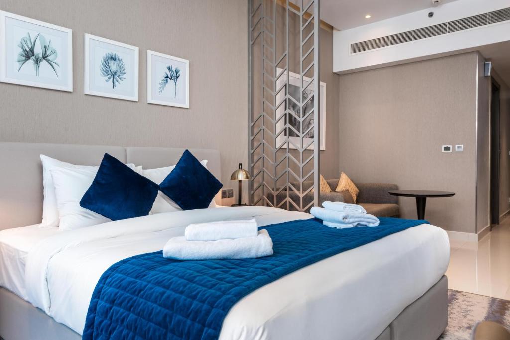 Postel nebo postele na pokoji v ubytování Vacay Lettings - Damac Prive studio