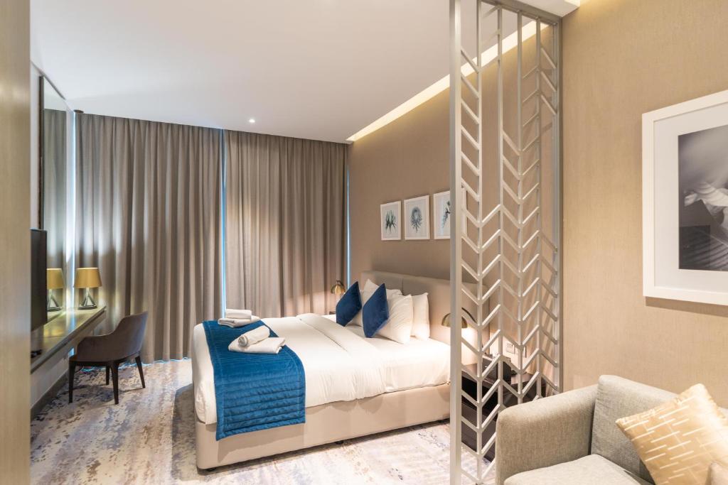 Postel nebo postele na pokoji v ubytování Vacay Lettings - Damac Prive studio
