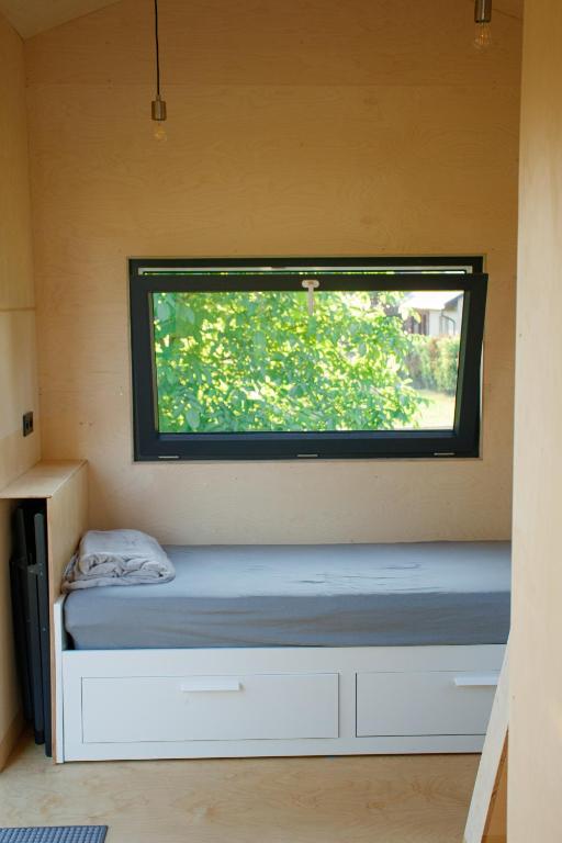 Postel nebo postele na pokoji v ubytování domek Tisá