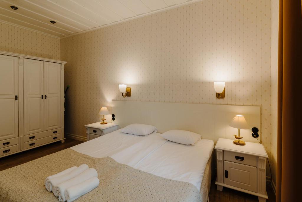 Postel nebo postele na pokoji v ubytování Pargimaja Apartments
