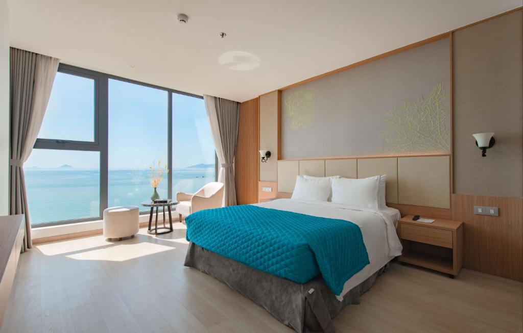 Postel nebo postele na pokoji v ubytování Navada Beach Hotel