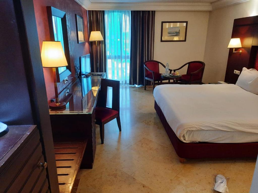 Postel nebo postele na pokoji v ubytování Hotel Borj Rabat - A member of Barceló Hotel Group