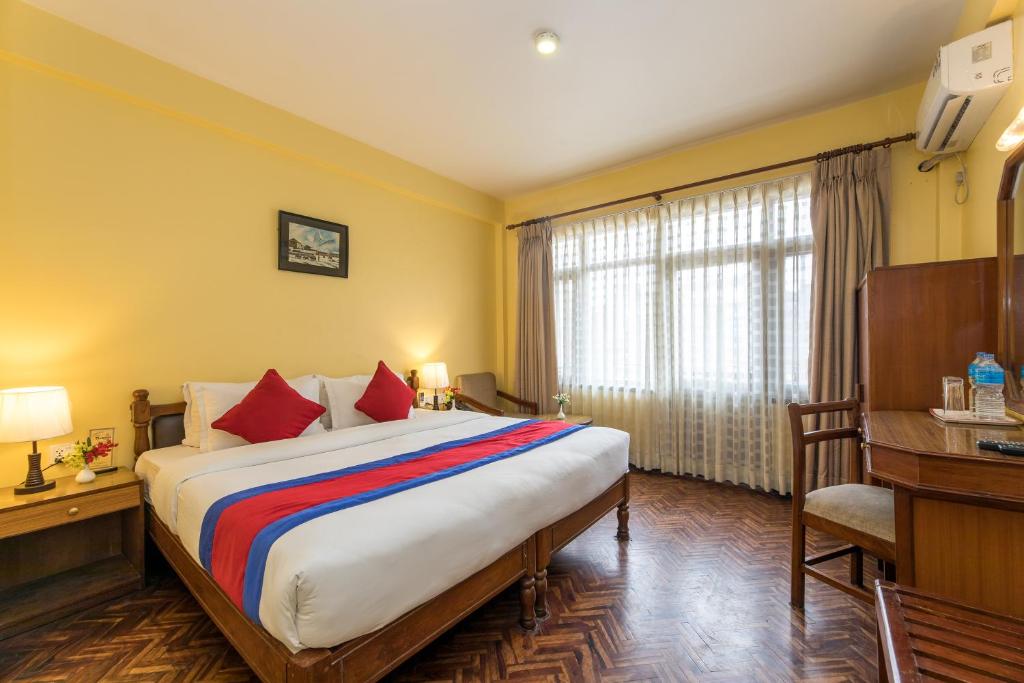 Postel nebo postele na pokoji v ubytování Hotel Thamel