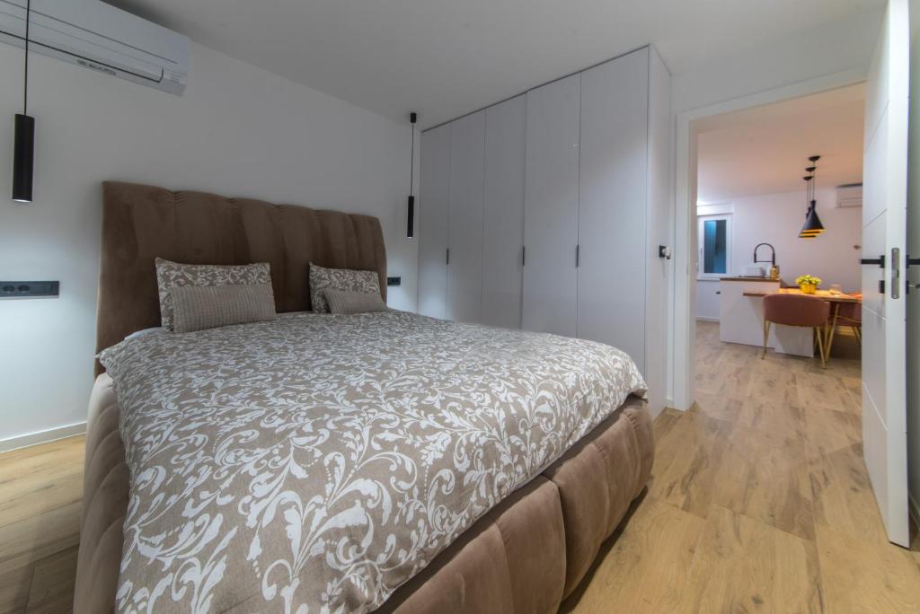 Postel nebo postele na pokoji v ubytování Zitab Luxury Apartment