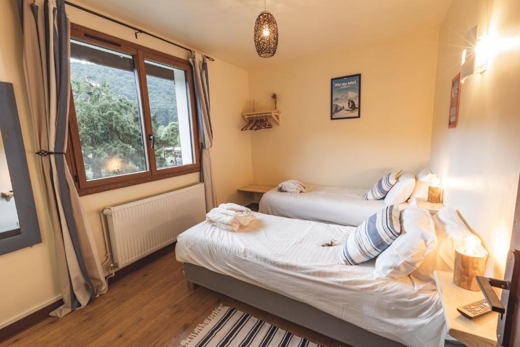 Postel nebo postele na pokoji v ubytování Chalet Ouréa