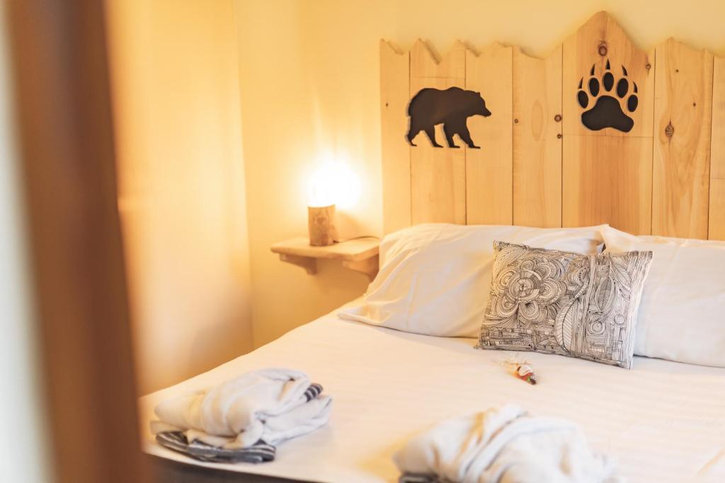 Postel nebo postele na pokoji v ubytování Chalet Ouréa
