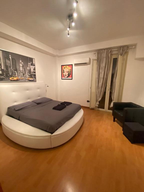 Dada Apartment tesisinde bir odada yatak veya yataklar