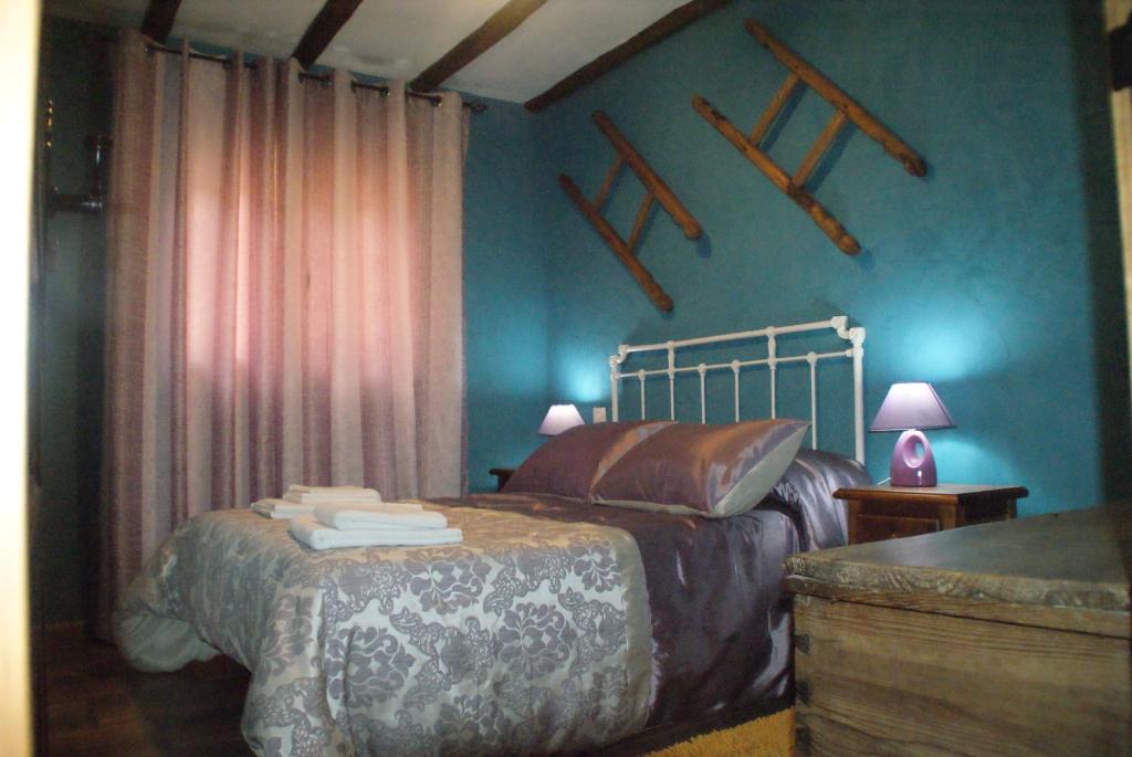 Posteľ alebo postele v izbe v ubytovaní Dulce Encanto del Valle