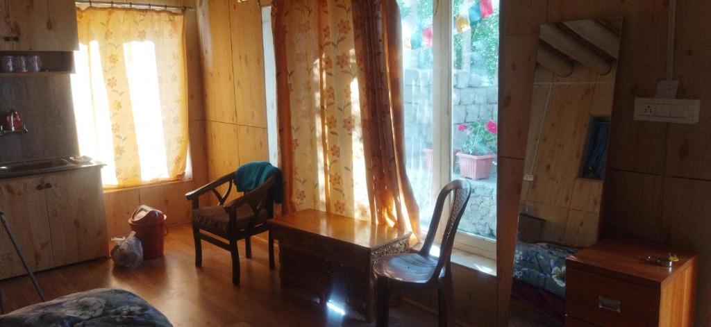 Posezení v ubytování Chosdup Guest House