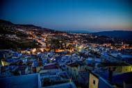 a view of a city at night at Casa La Palma in Chefchaouene
