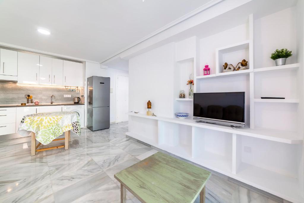 Kuchyň nebo kuchyňský kout v ubytování Apartamento Faro 2