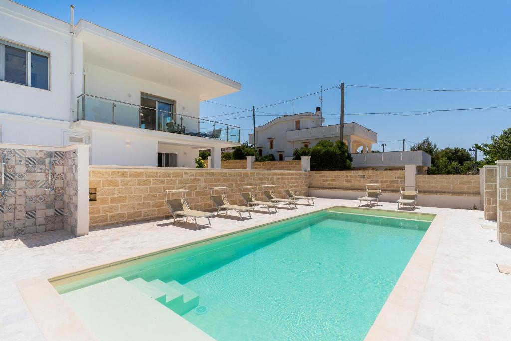 The swimming pool at or close to Villa Finibus Terrae