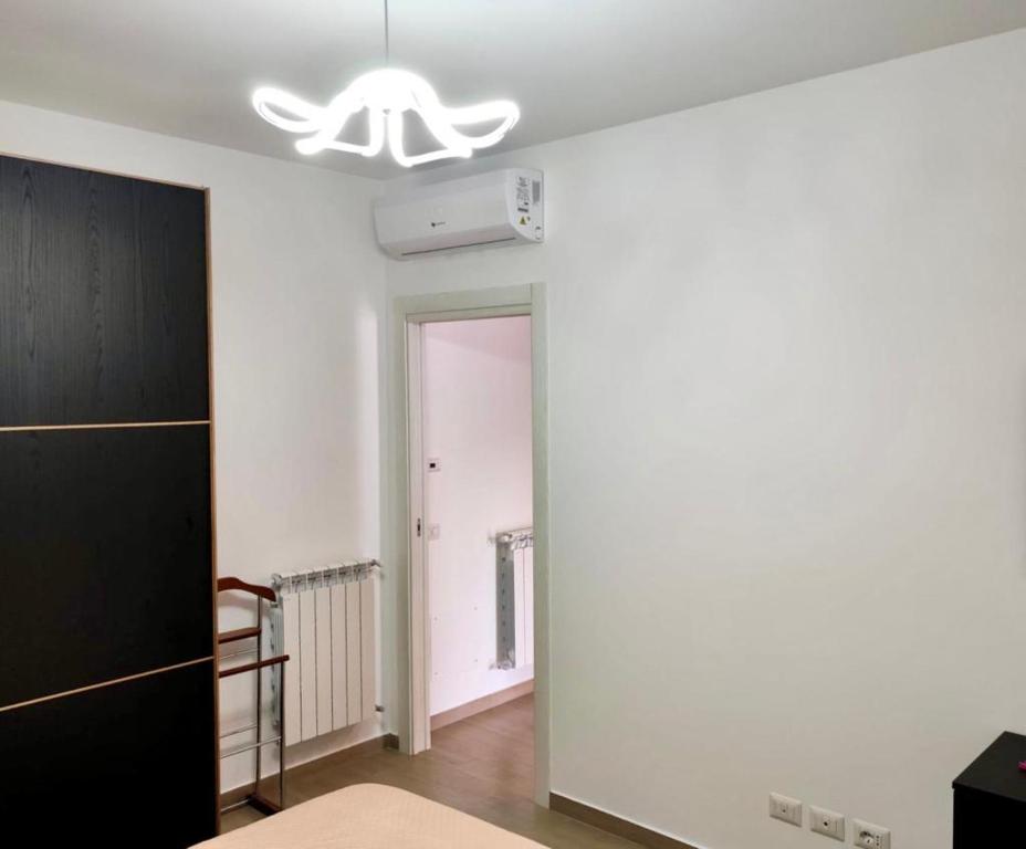 Posteľ alebo postele v izbe v ubytovaní Tiny Green apartament in Rome - Magliana