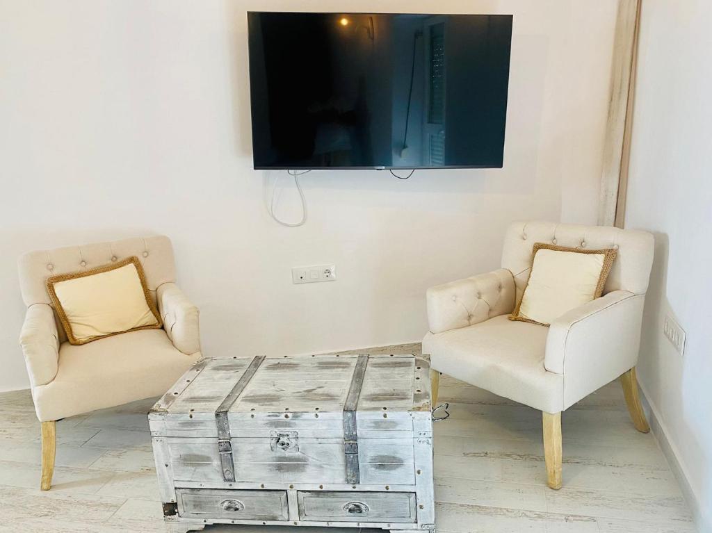 TV a/nebo společenská místnost v ubytování Luz, aire y mar Grupo AC Gestion