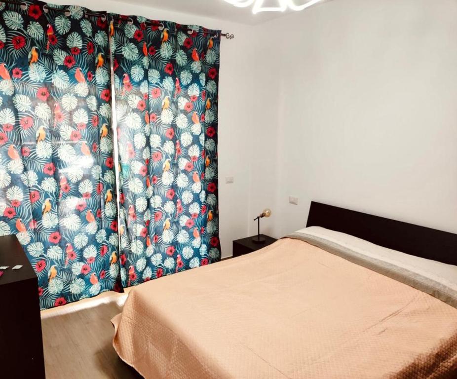 Posteľ alebo postele v izbe v ubytovaní Tiny Green apartament in Rome - Magliana