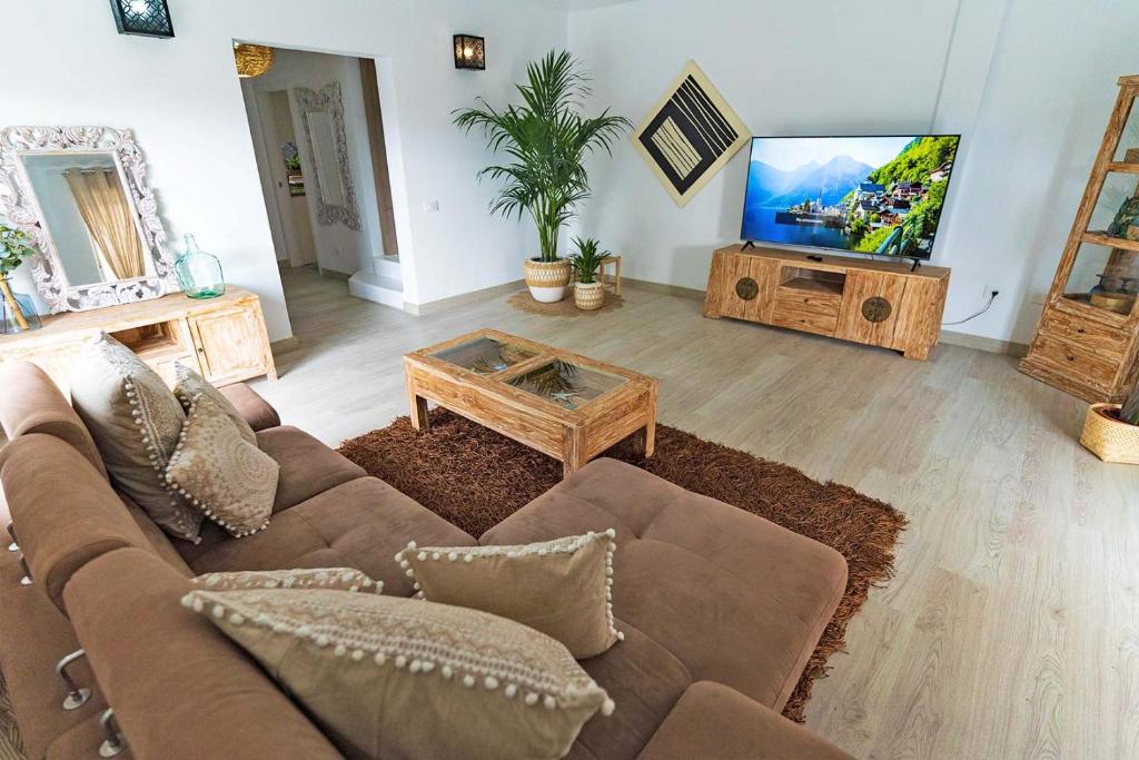 TV a/nebo společenská místnost v ubytování Villa Namaste