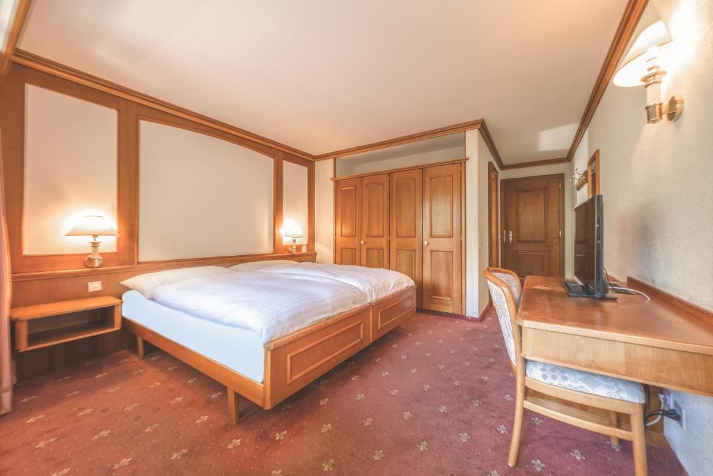 Postel nebo postele na pokoji v ubytování Antares Hotel