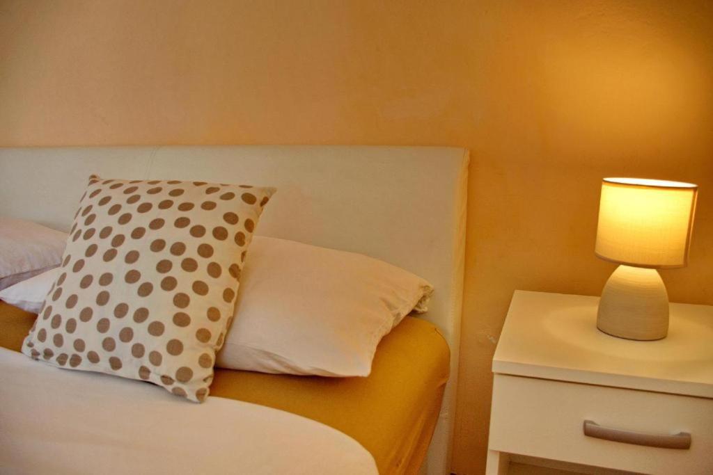 Łóżko lub łóżka w pokoju w obiekcie Two bedroom apartments Elvira