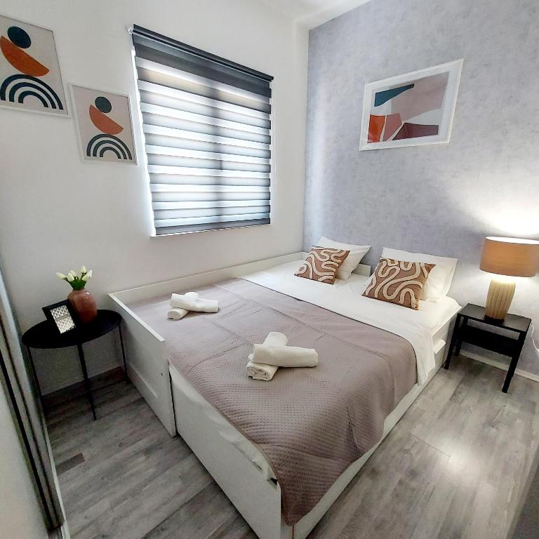 Posteľ alebo postele v izbe v ubytovaní Luxury Garden Penthouse *MK*