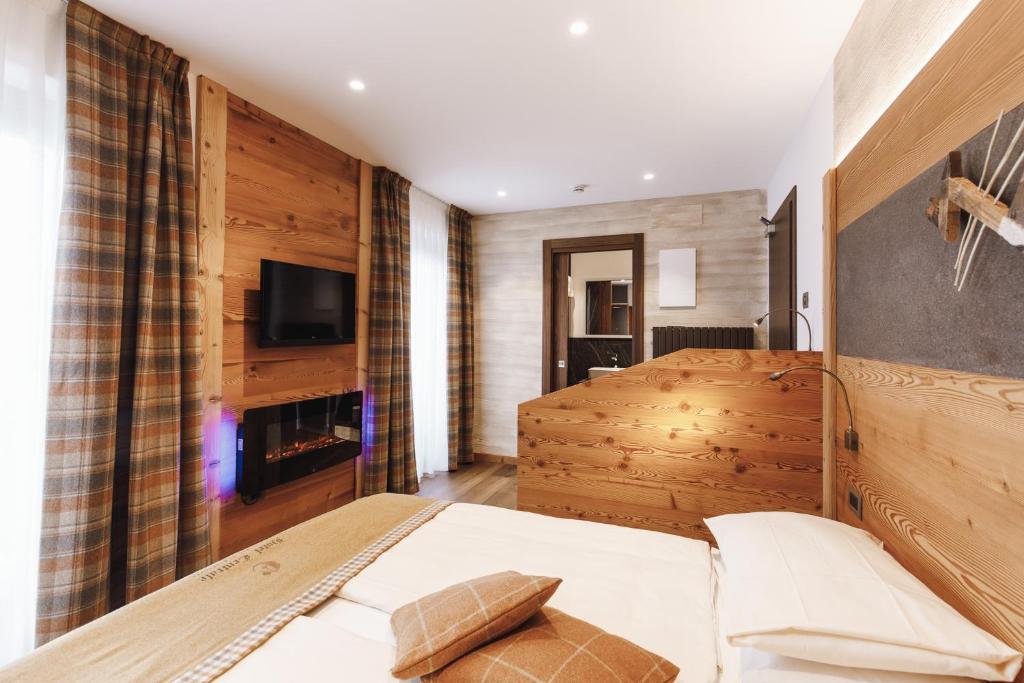 TV a/nebo společenská místnost v ubytování Albergo Centrale