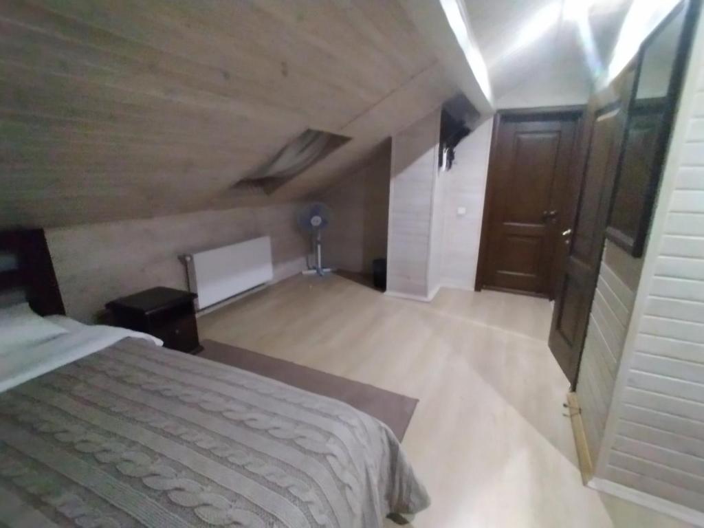 Postel nebo postele na pokoji v ubytování Hermes