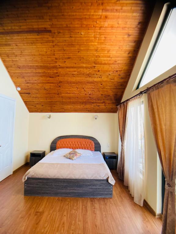 Postel nebo postele na pokoji v ubytování Hotel Tramonto