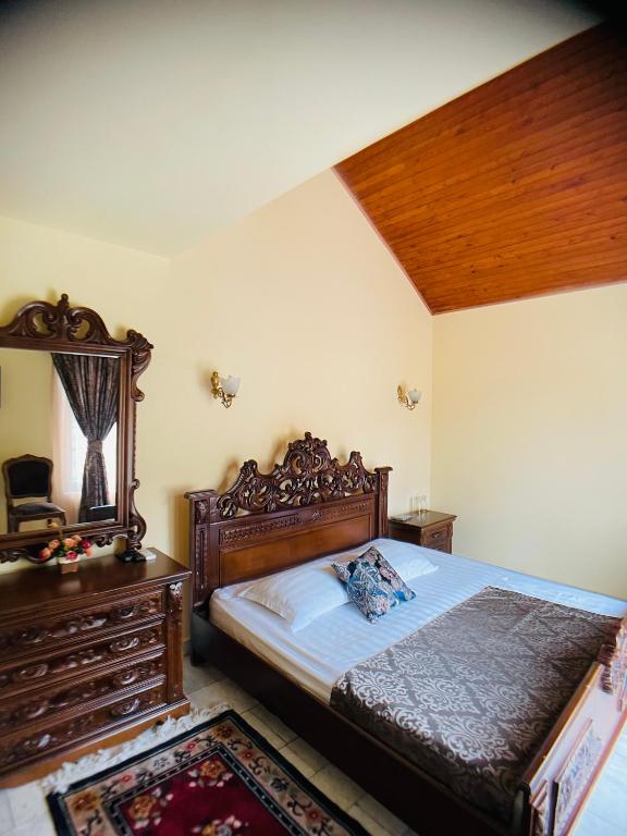 Postel nebo postele na pokoji v ubytování Hotel Tramonto