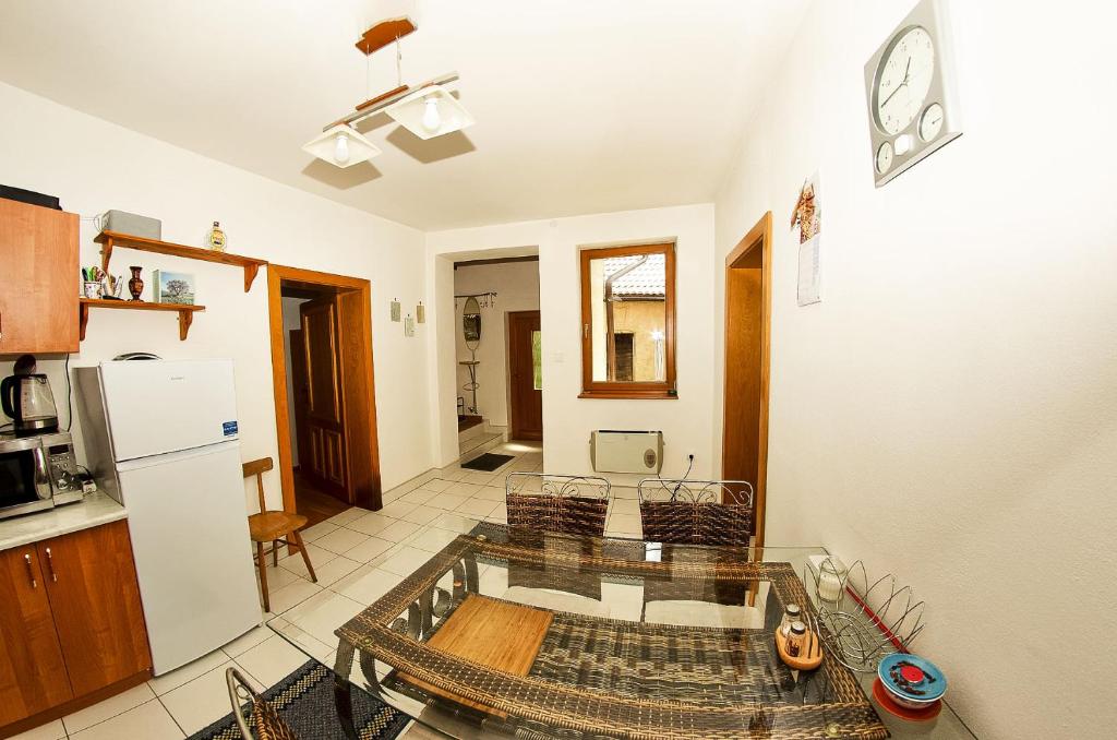 Kuchyň nebo kuchyňský kout v ubytování Apartmany pod Tatrami