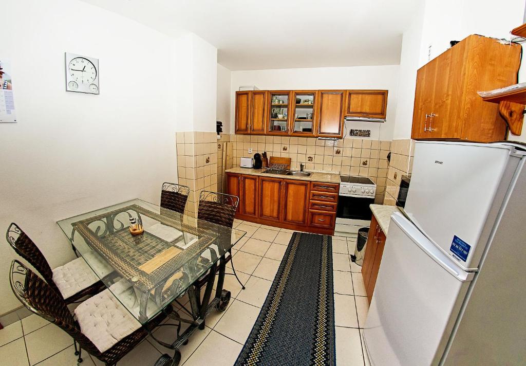 Kuchyň nebo kuchyňský kout v ubytování Apartmany pod Tatrami
